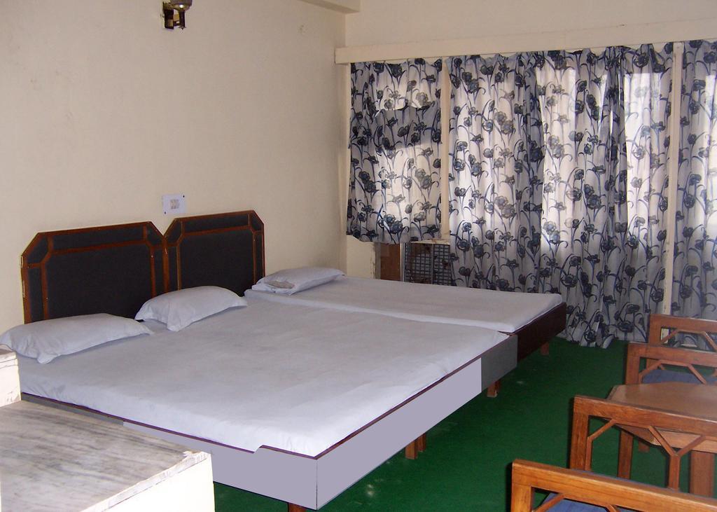 Hotel Mansarover International Haridwār Quarto foto